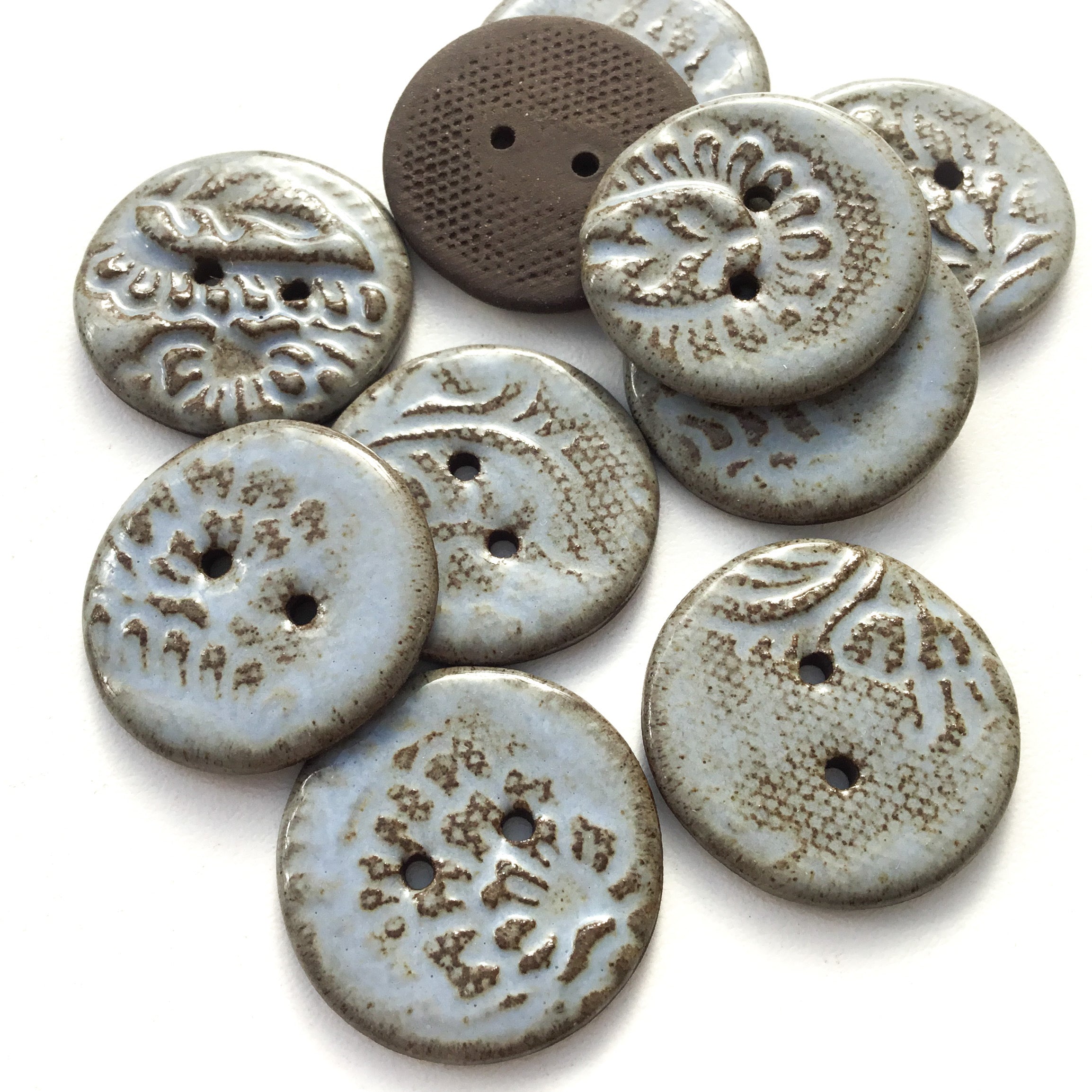 buy-all-your-favorite-gray-blue-paisley-black-clay-stoneware-buttons-1-1-16-online-now_1.jpg